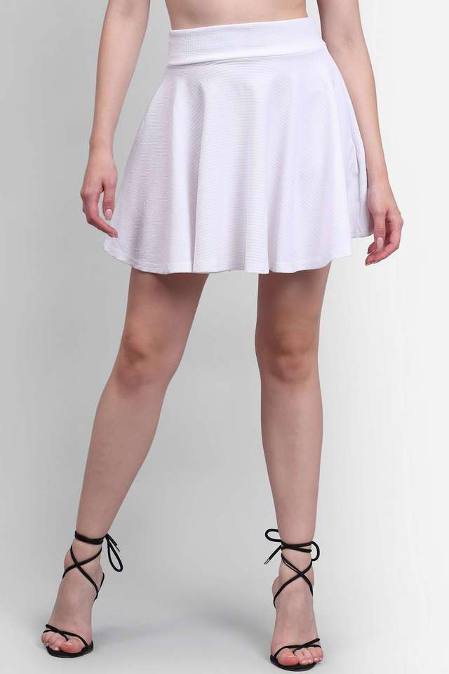 スカート muguet spangle mini skirt White muguet（ミュゲ）の「【裏地付き】コットンリボンミニスカート