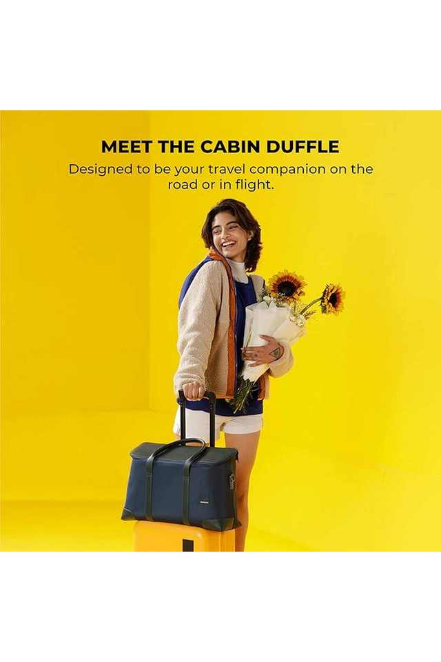 Buy Mokobara blue The Cabin Leather Women's Duffle Bag Shoppers Stop